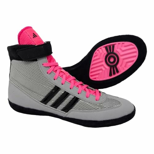 Gray wrestling shoes with pink soles and laces